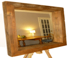 Go to hand crafted wood framed mirrors.